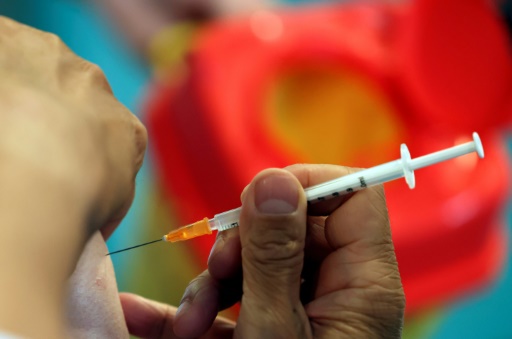 Une injection du vaccin de Pfizer le 13 septembre 2021 à Paris
